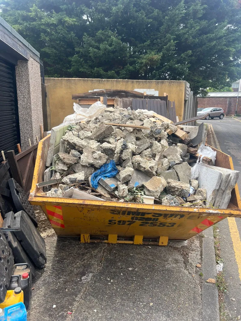 8-yard skip filled with concrete waste in Cavendish Gardens, Ilford