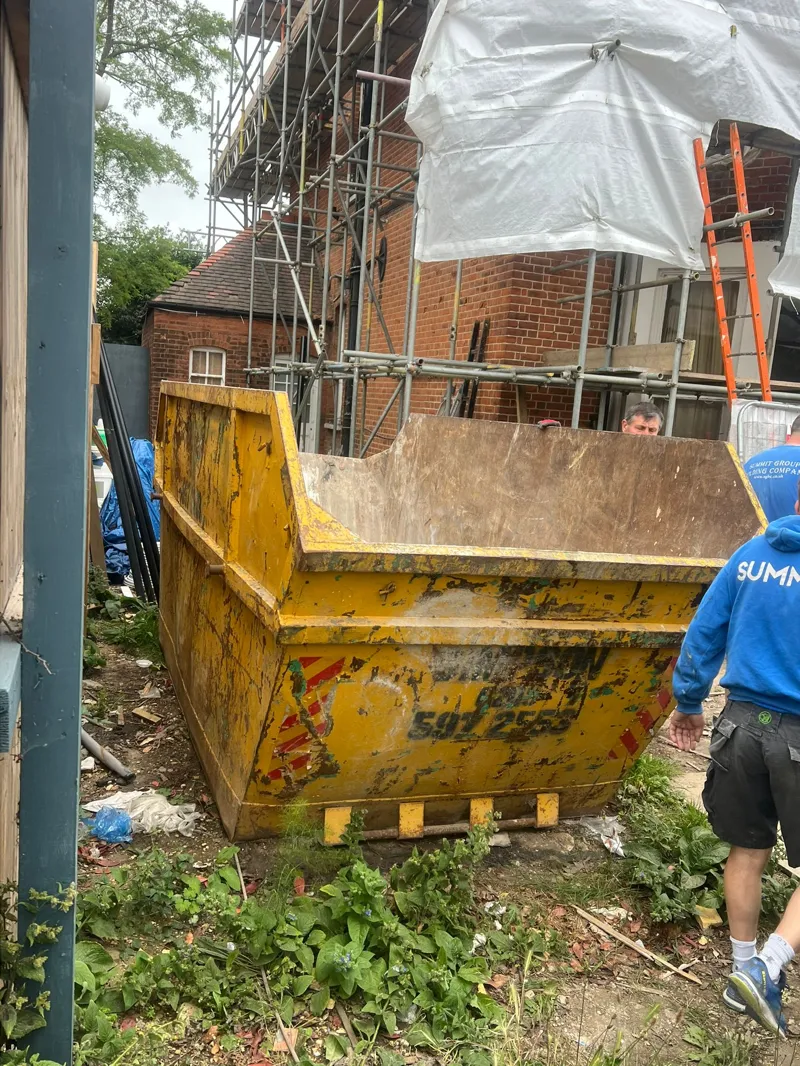 12 yard skip on residential construction site in Grove Park – side view