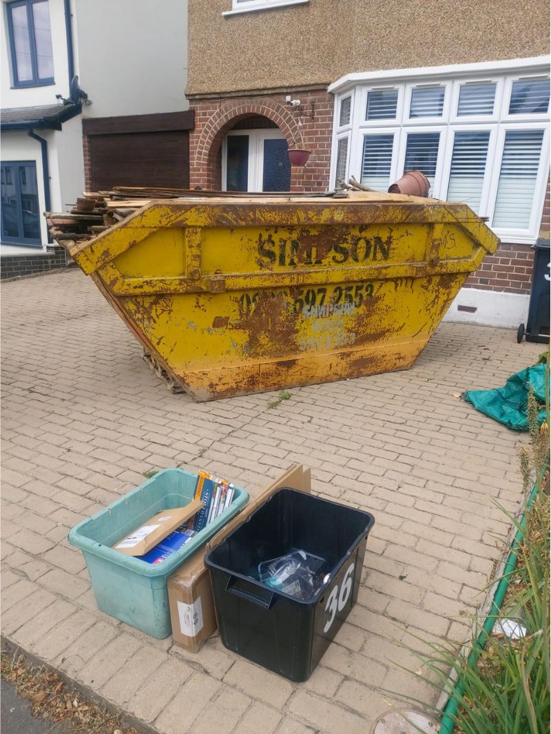 8-yard skip collected for household rubbish removal on Grenville Gardens, Woodford Green by Simpson Skip Hire Ltd.